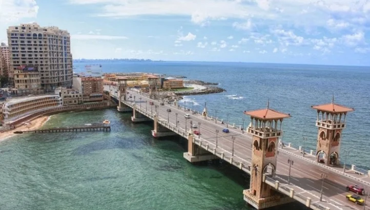 Aerial view of Stanley Bridge in Alexandria with its ornate corner towers stretching across the Mediterranean coastline